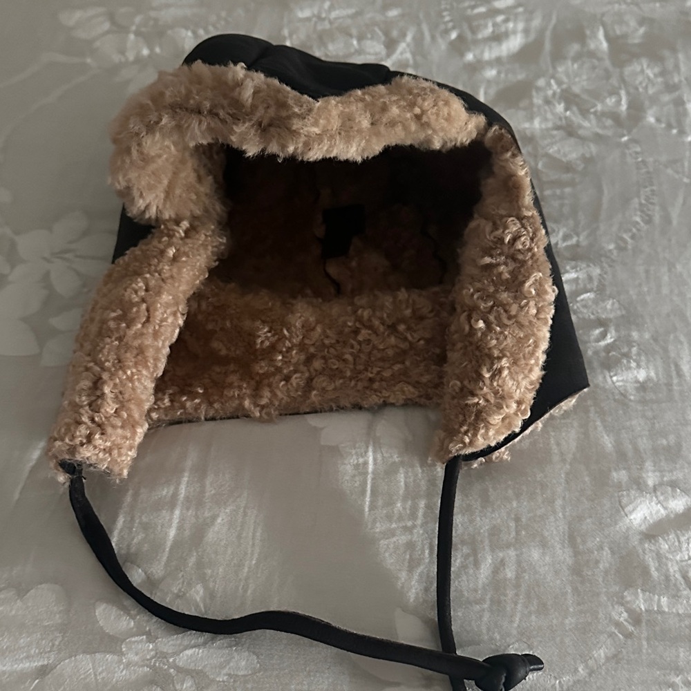 Black and Tan Shirling Aviator Hat. Reversible and sheepskin